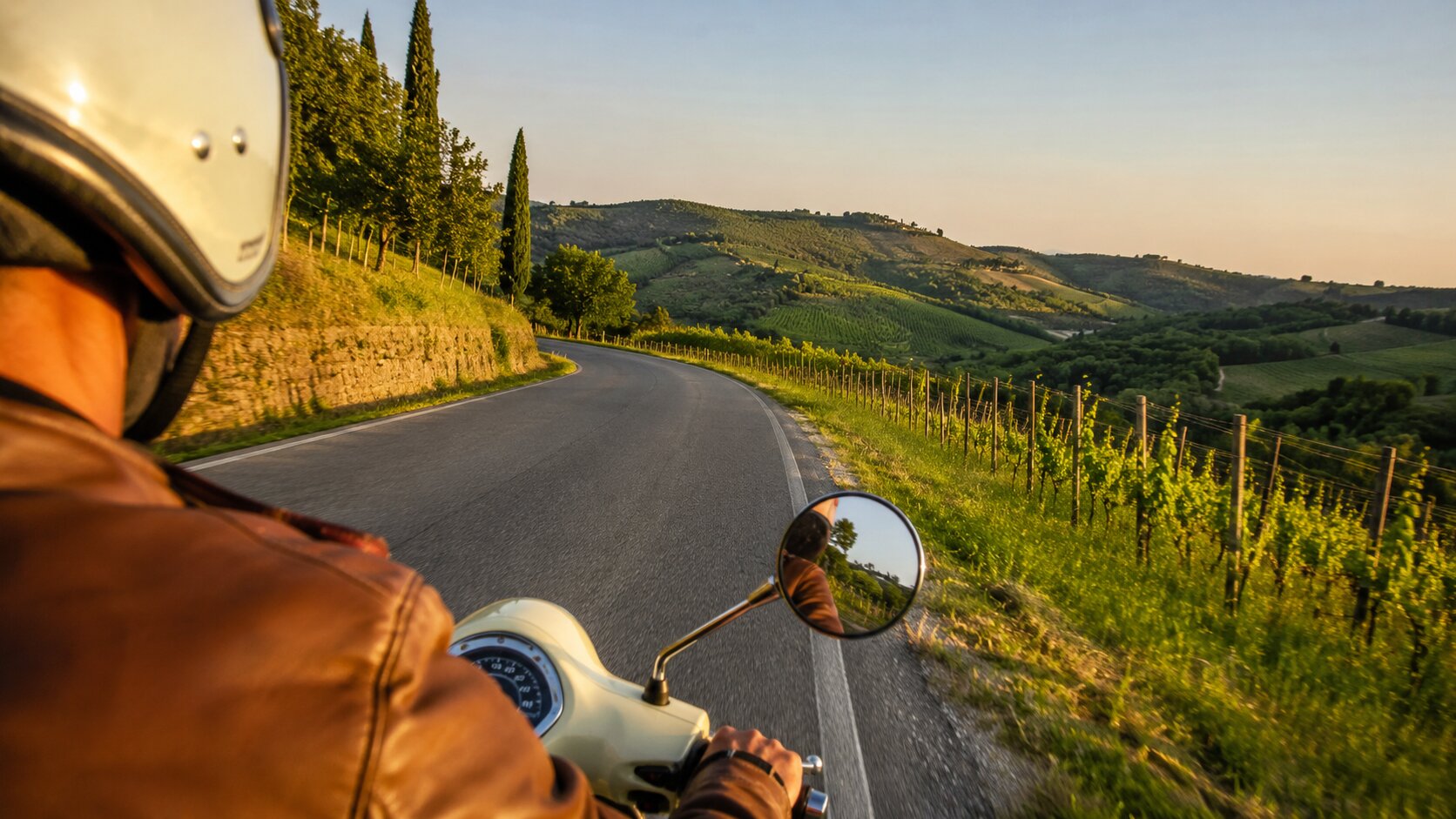Riding a Vespa along the scenic Via Chiantigiana