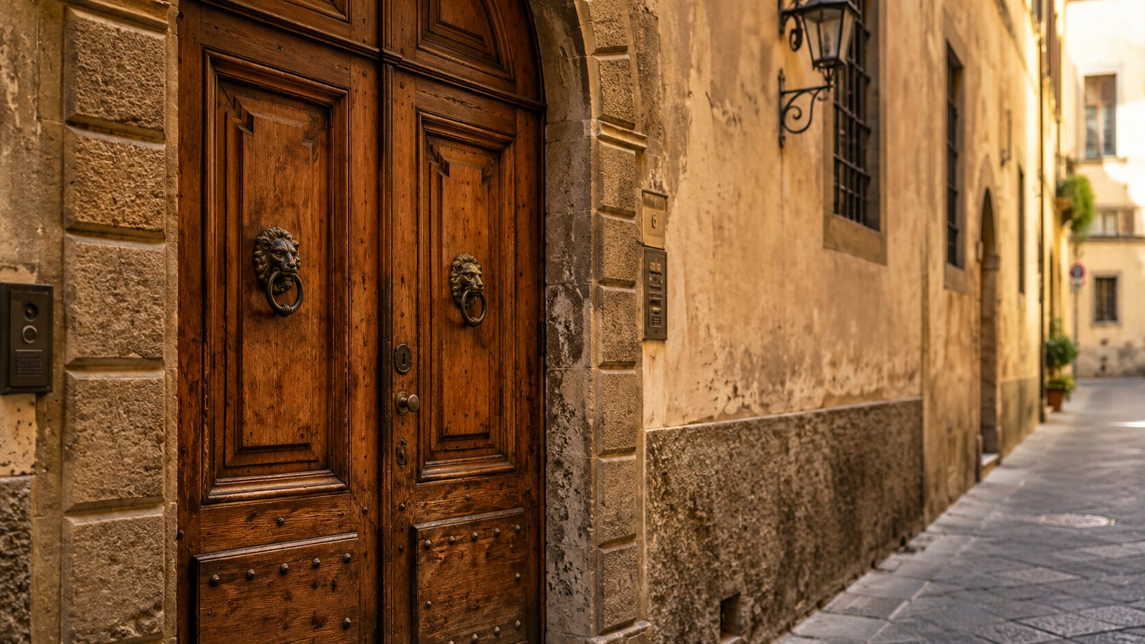 historic wooden door in Florence street with stone walls detail