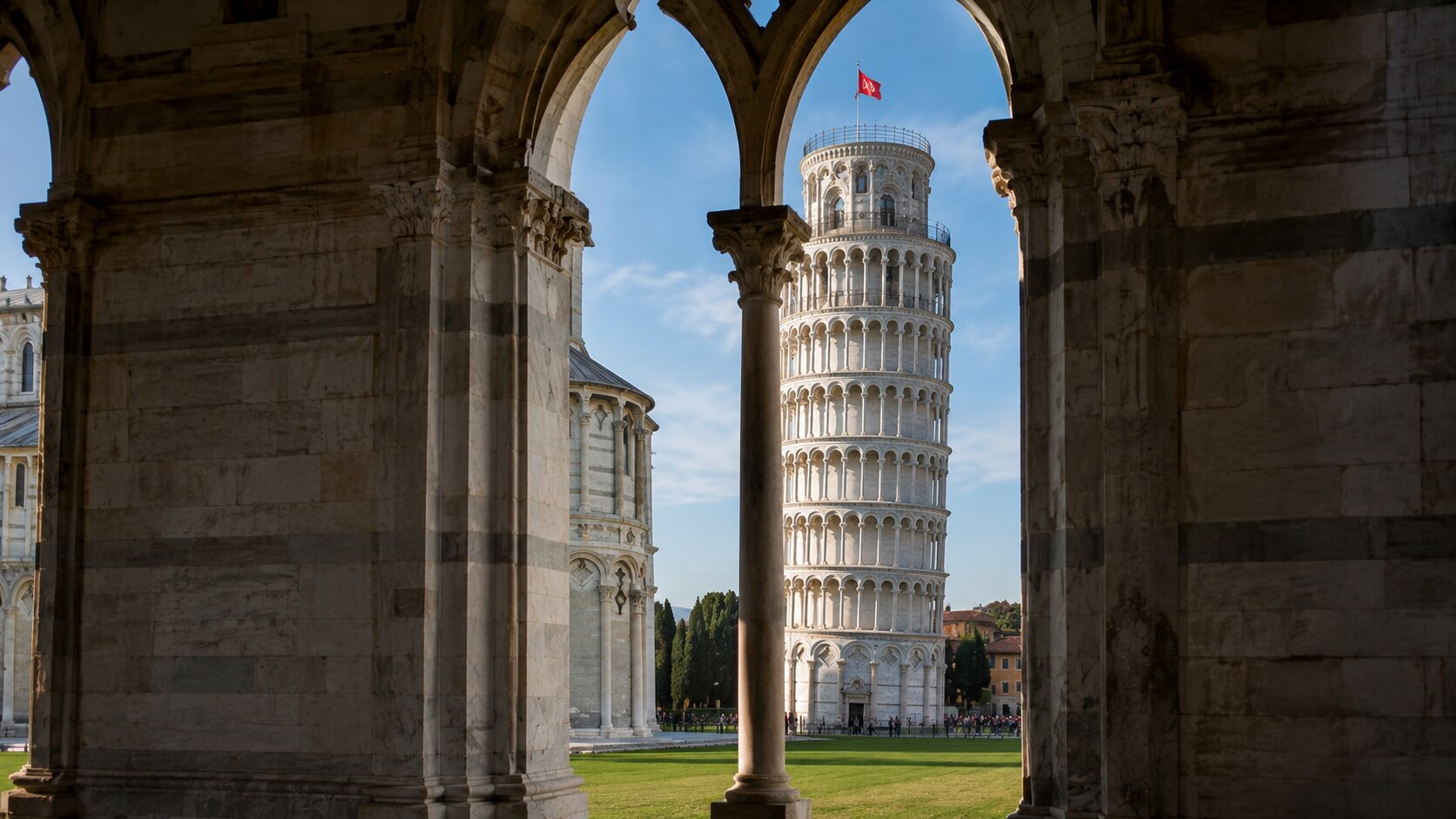 Leaning Tower framed by the Camposanto arch