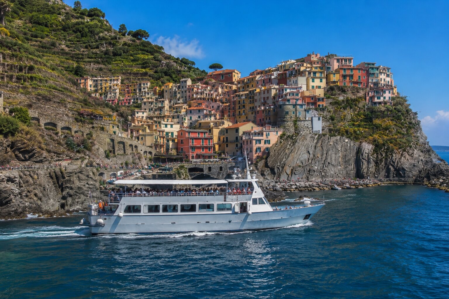 Ferry sailing along the Cinque Terre coast