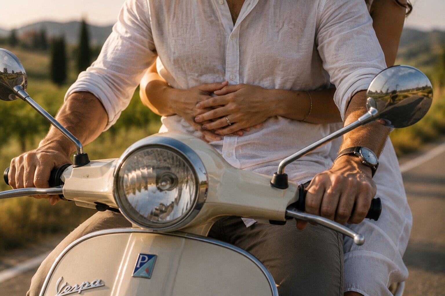 Couple holding each other on a Vespa
