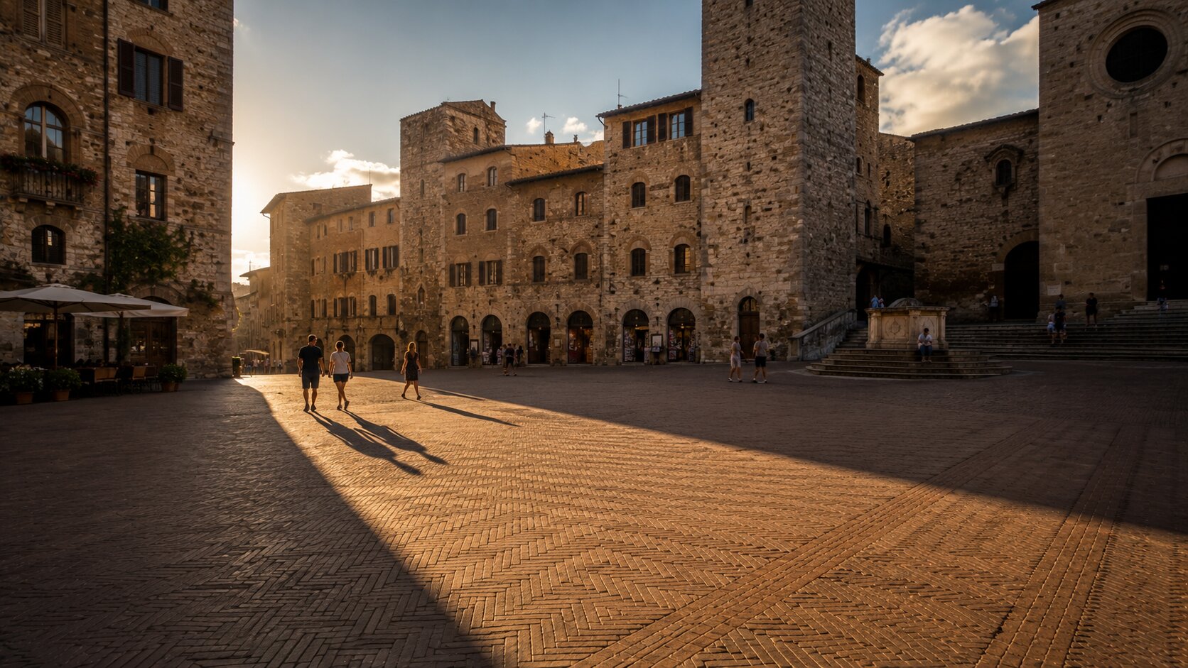 Tower shadows across San Gimignano at golden hour