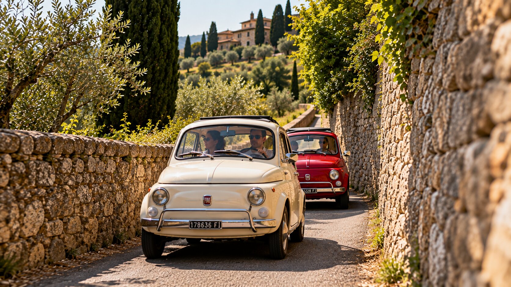 Fiat 500 driving on a narrow Tuscan road